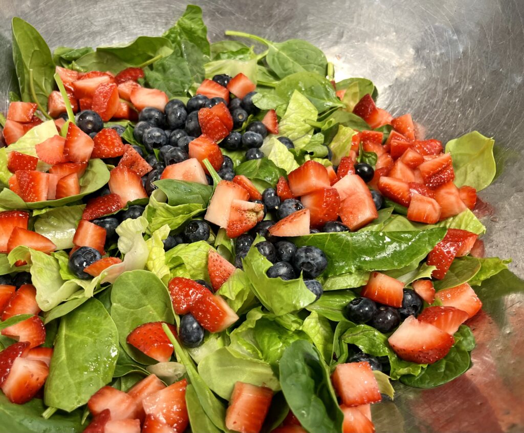 Honey Citrus Fruit Salad in mixing bowl.