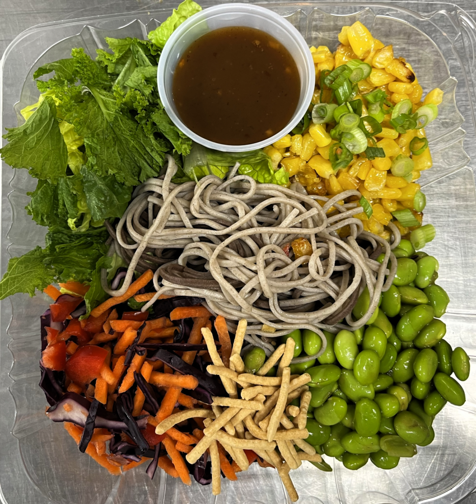 Edamame salad with noodles and dressing.