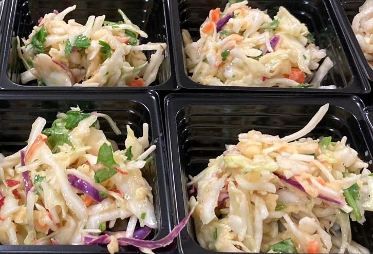 Apple Cilantro Slaw portioned for serving.