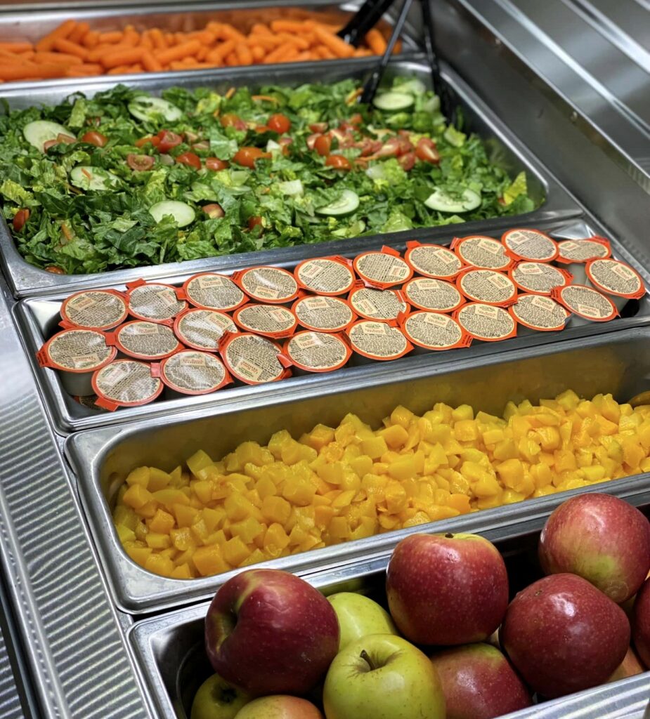 Apples on serving line.