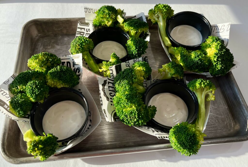 Broccoli Dippers with ranch dressing in baskets.