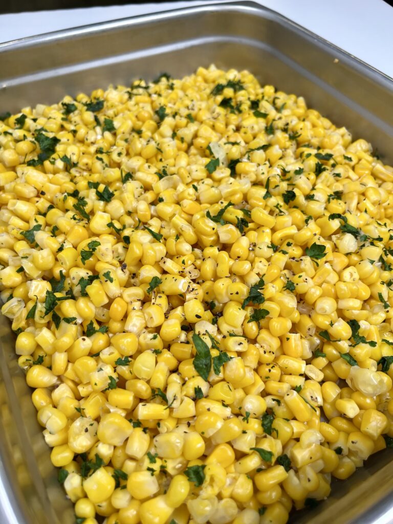 Steamed Corn in pan.