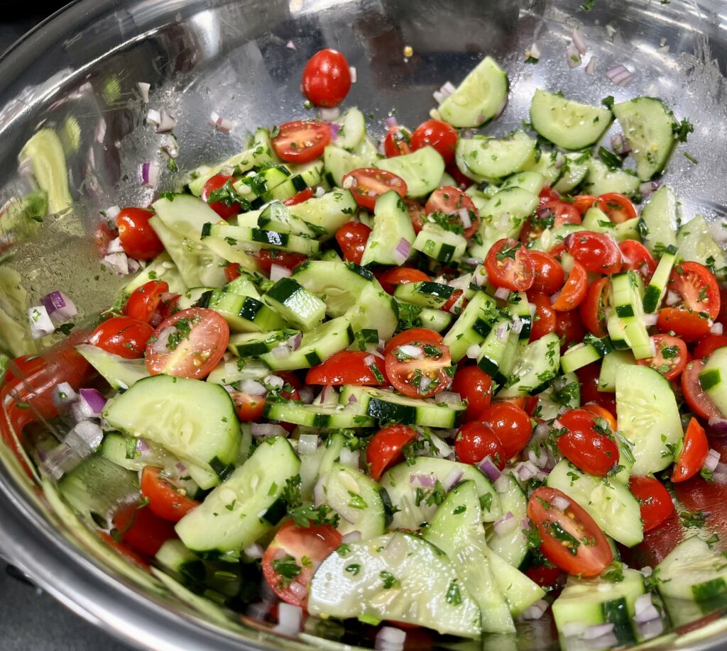 Persian Cucumber Tomato Salad in mixing bowl.