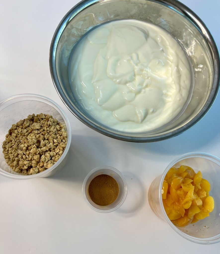Ingredients for Spiced Peach Granola parfaits.