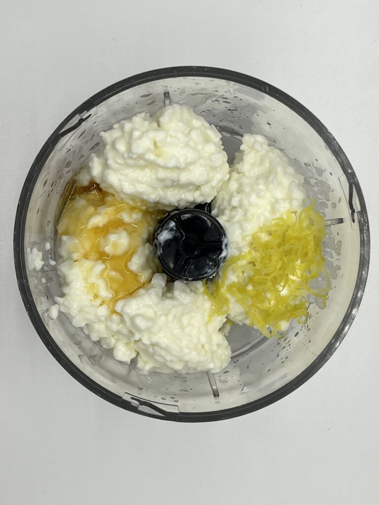 Cottage cheese with lemon juice, honey, and lemon zest ingredients.
