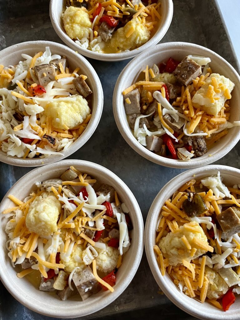 Cheesy egg, sausage & tot bake breakfast bowls