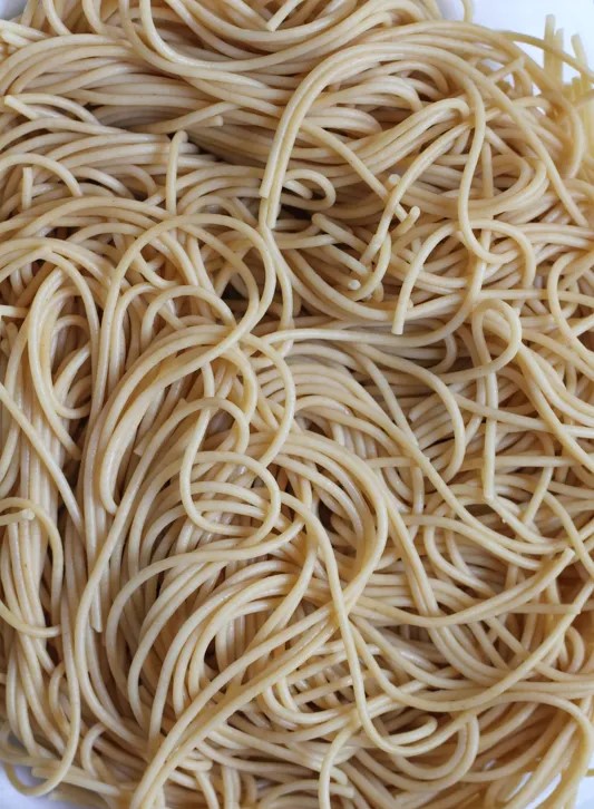Plain spaghetti pasta noodles.