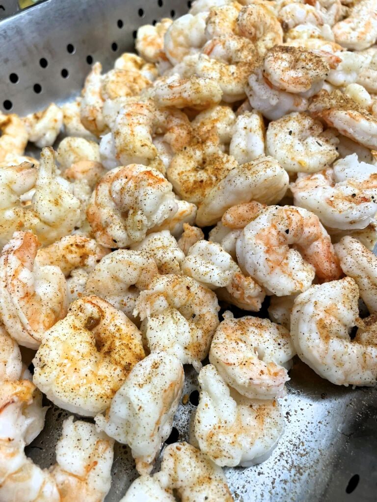 Steamed shrimp seasoned with blackening seasoning.
