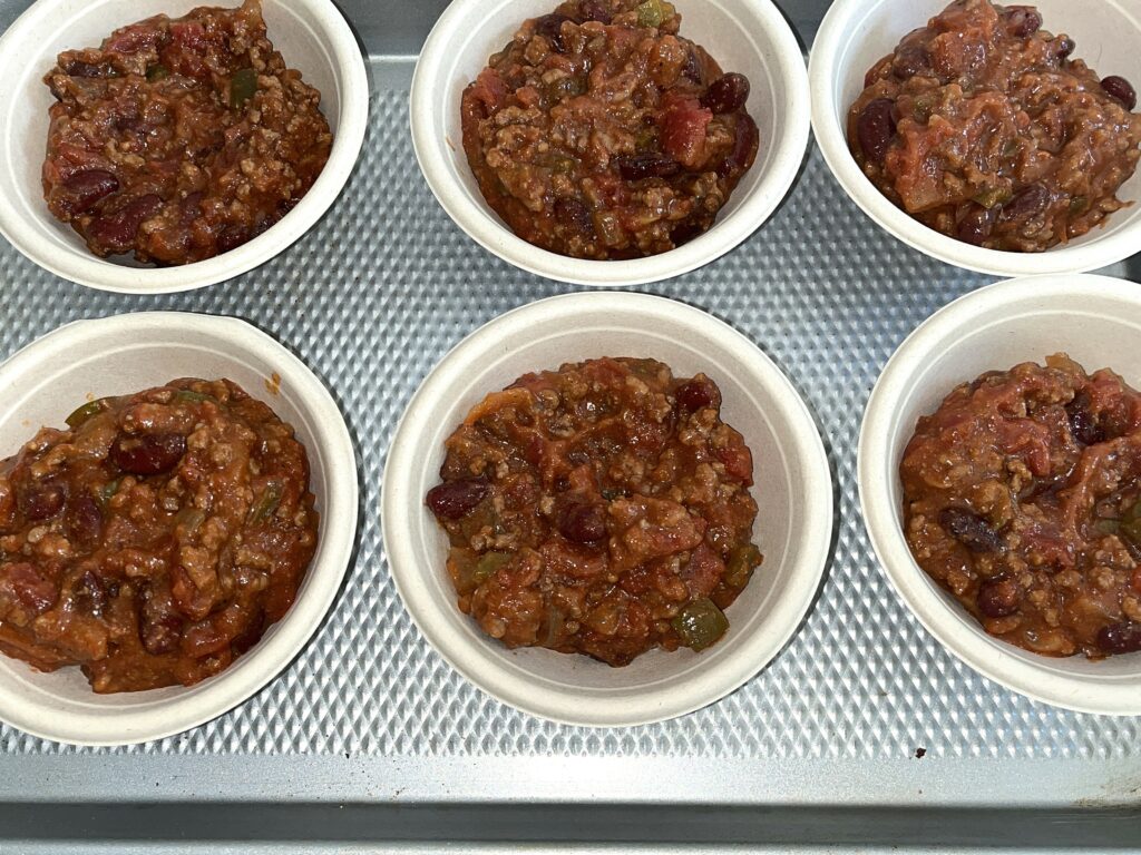 Beef chili with beans portioned.