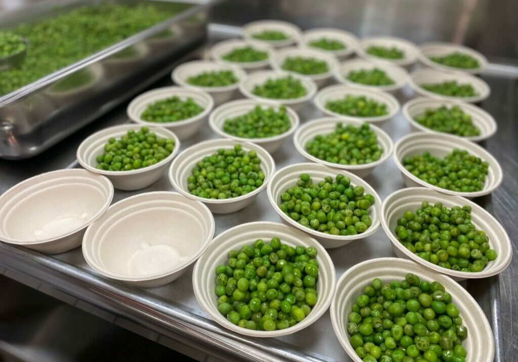 Steamed Peas portioned for serving.