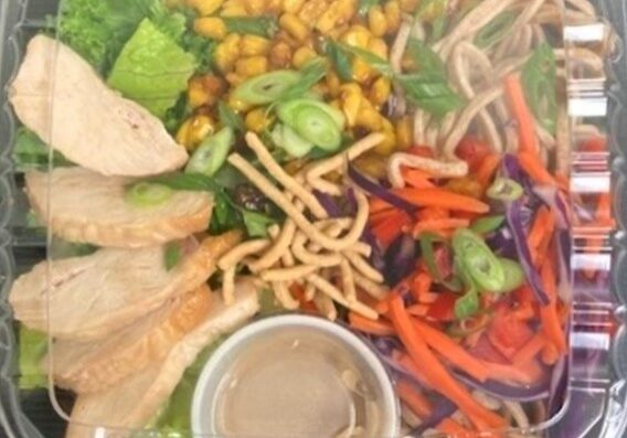 Ginger Chicken Noodle Salad in a grab and go container.