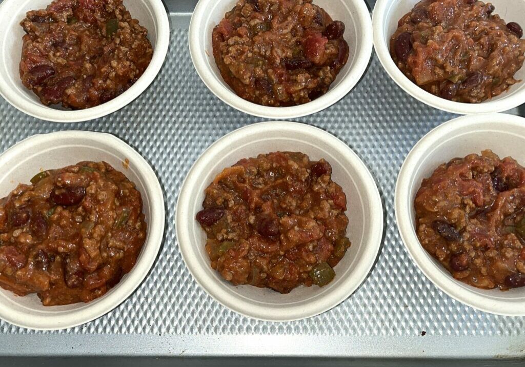 Beef chili with beans portioned.