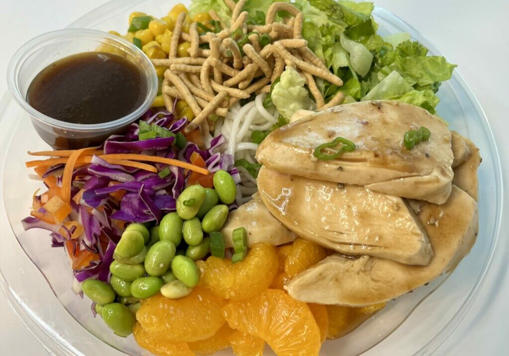 Ginger Chicken Noodle Salad with dressing.