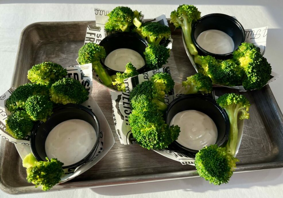 Broccoli Dippers with ranch dressing in baskets.