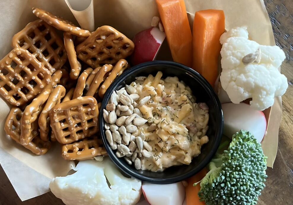 Dill Pickle Pimento Cheese, pretzels and veggie dippers.