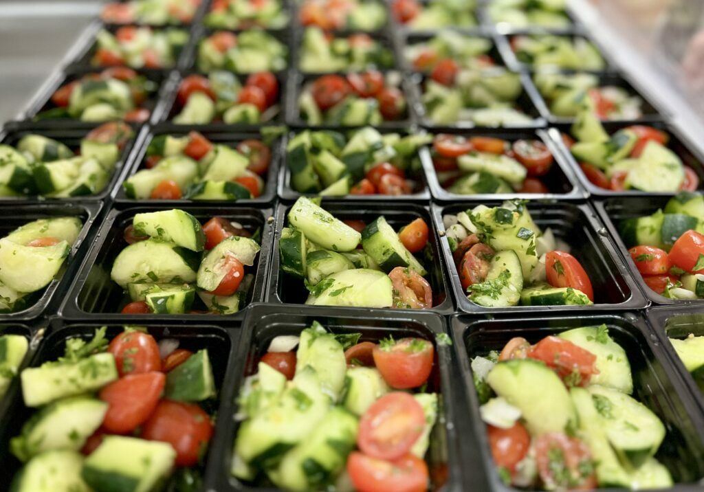 Persian Cucumber & Tomato Salad portioned for serving.