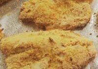 Oven Fried Tilapia on a pan.