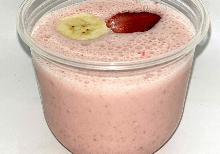 Breakfast smoothie with yogurt, strawberries and banana.