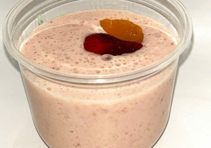 Breakfast smoothie with yogurt, mandarin and strawberries